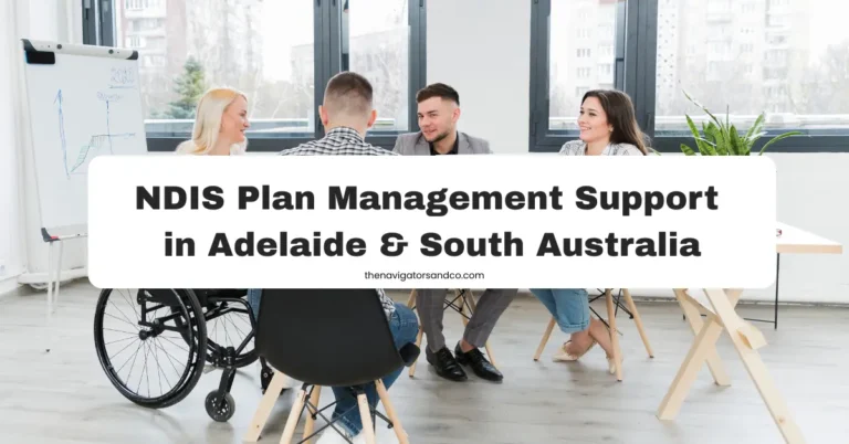 A group of four professionals seated around a table in a bright, modern office with large windows. One individual is seated in a wheelchair, with their back to the camera. A large white text box in the center of the image reads "NDIS Plan Management Support in Adelaide & South Australia," with the website "thenavigatorsandco.com"
